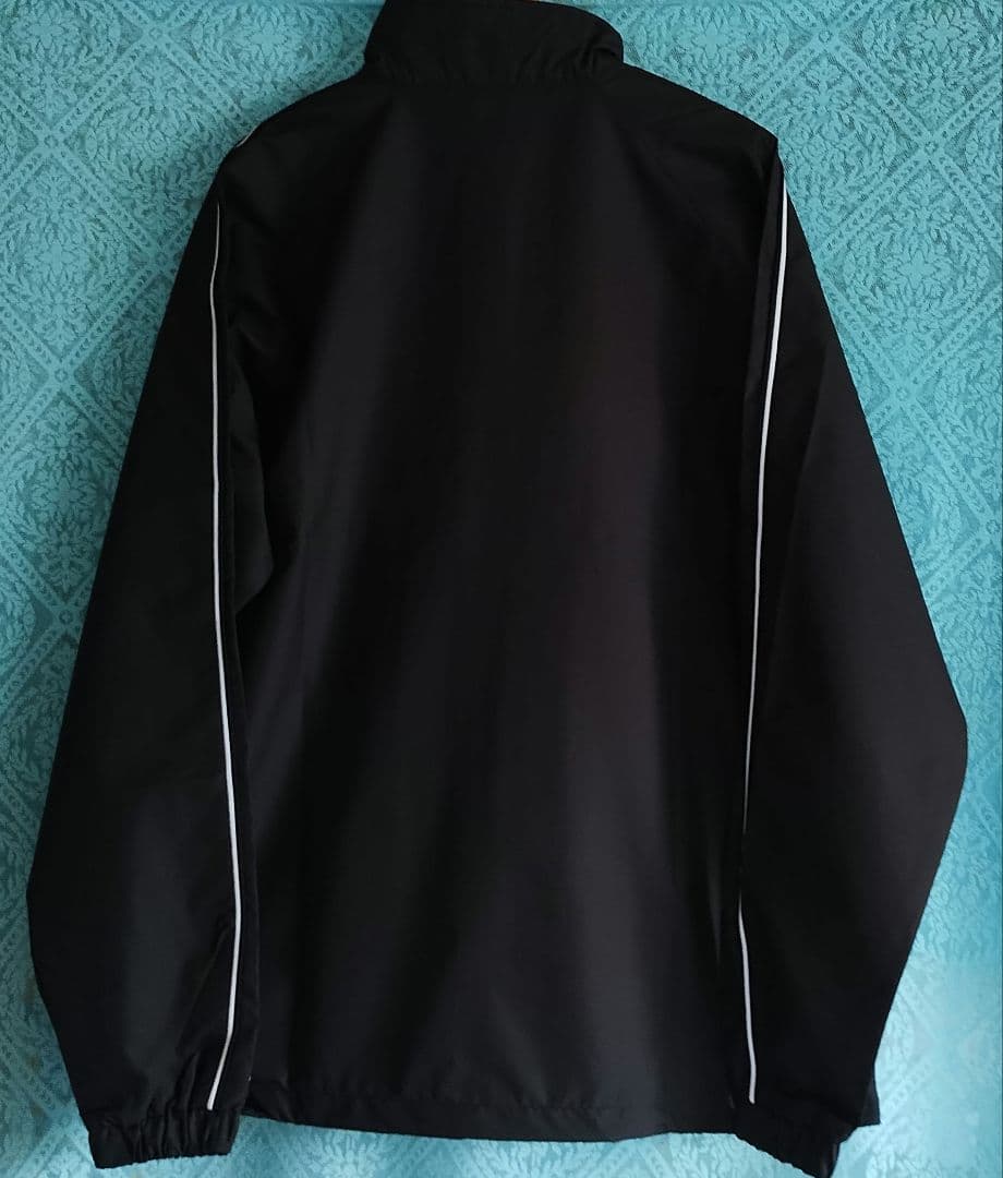 新品レディース Nike 上下セット上着 L サイズ 　パンツ M サイズ