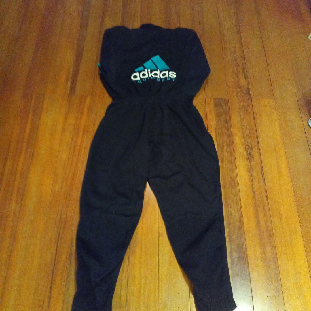 m*e様 アディダス エキップメント ジャンプスーツ D8 ブラック/ターコイズ