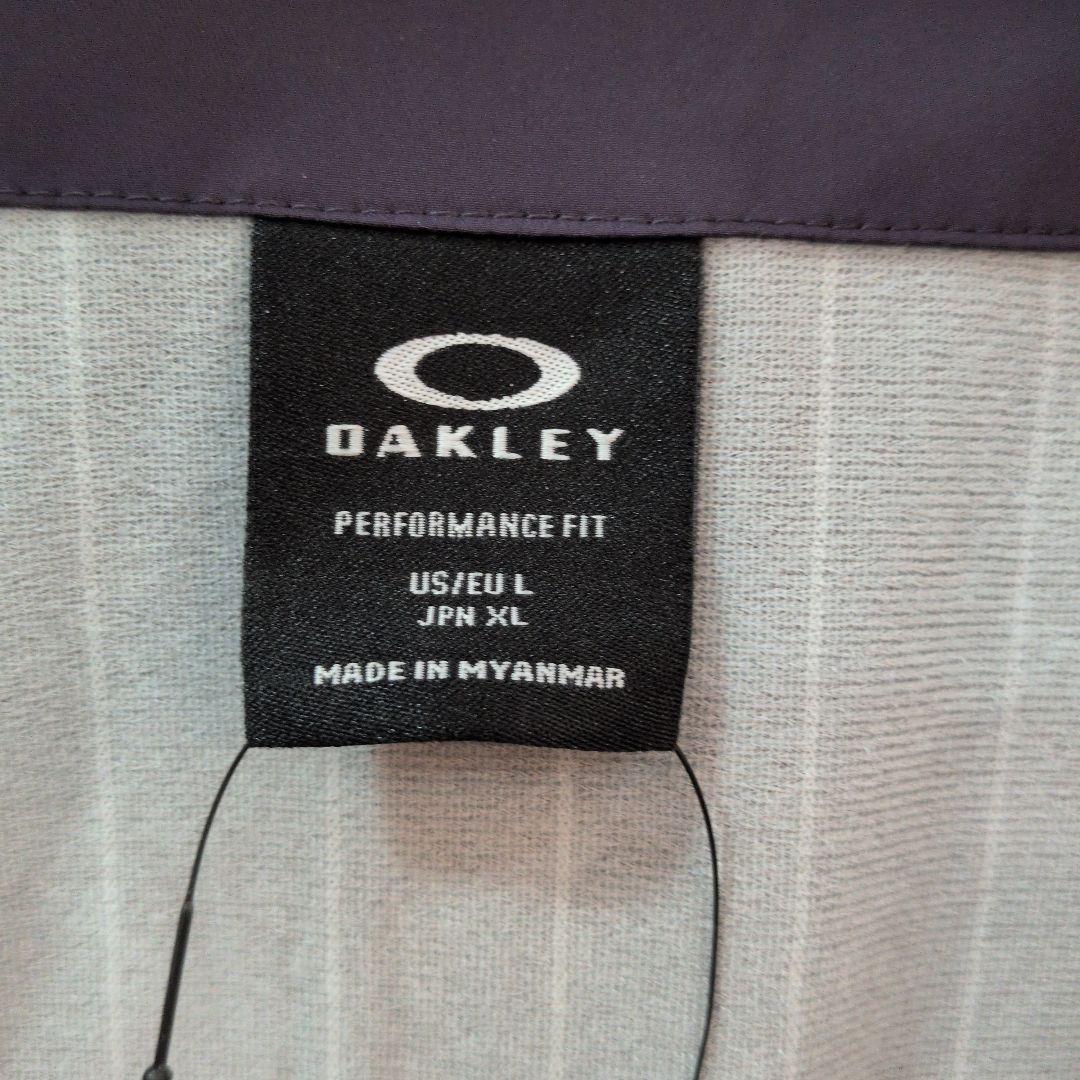 新品タグ付オークリー　ゴルフ　ウィンドブレーカー　XL パープル