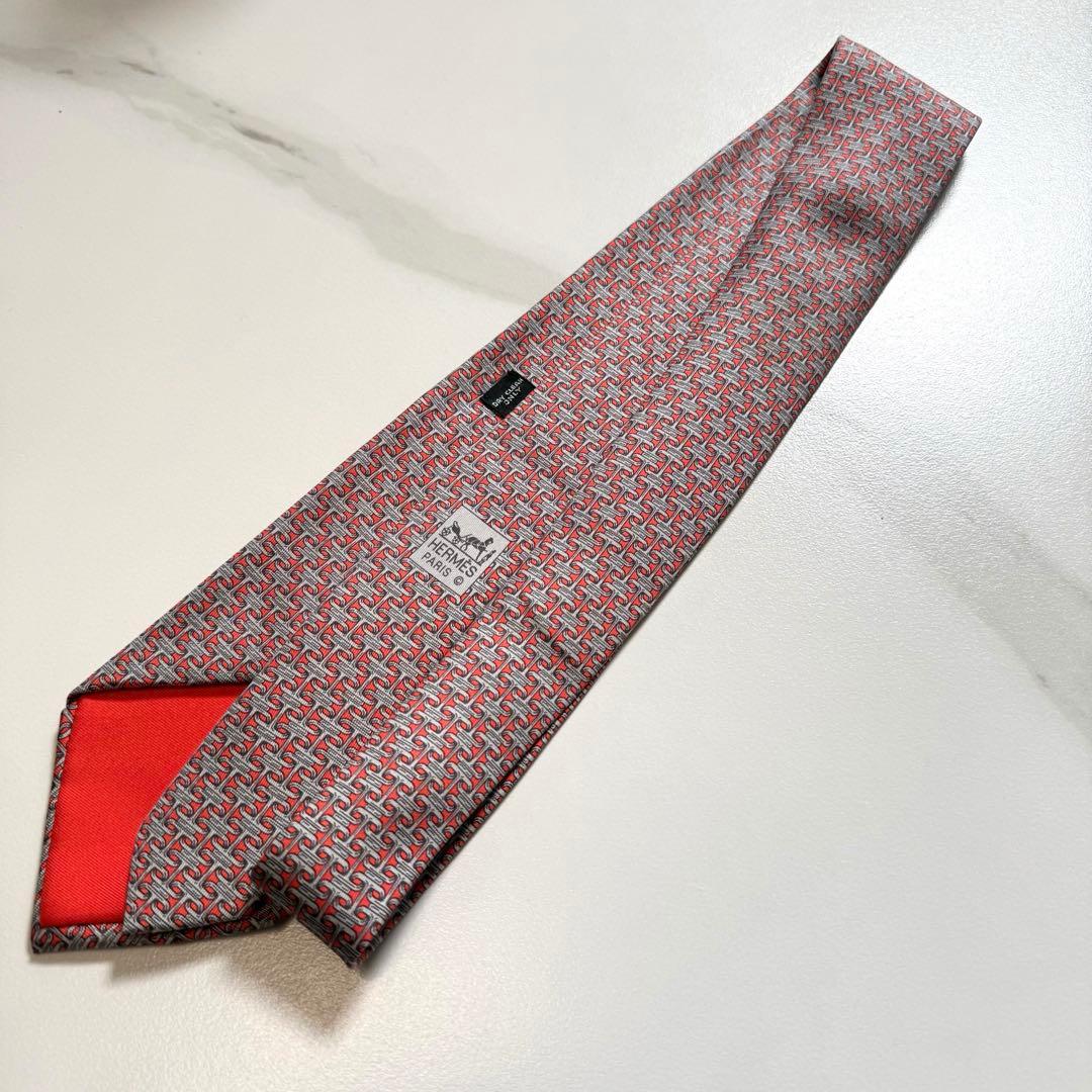 【正規品】未使用品HERMES エルメス　ネクタイ　朱色シルバー色