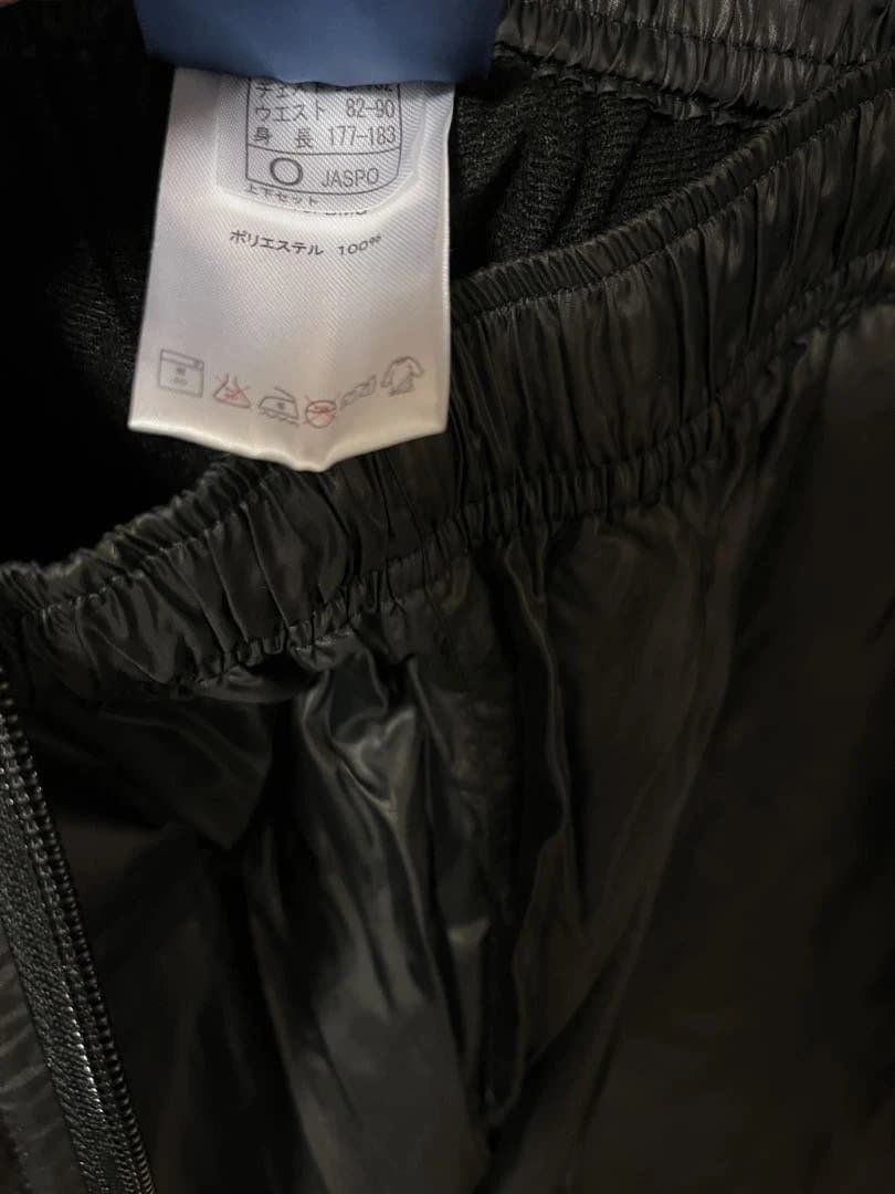 新品未使用hummel ブラック ウィンドブレーカー上下セットサイズO（XL）