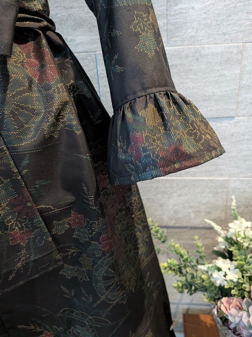 A276黒系大島紬Aラインワンピース★リボン・ブローチ