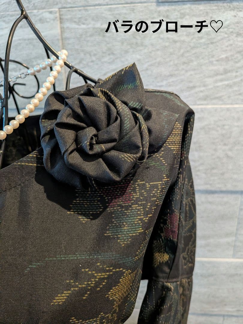 A276黒系大島紬Aラインワンピース★リボン・ブローチ